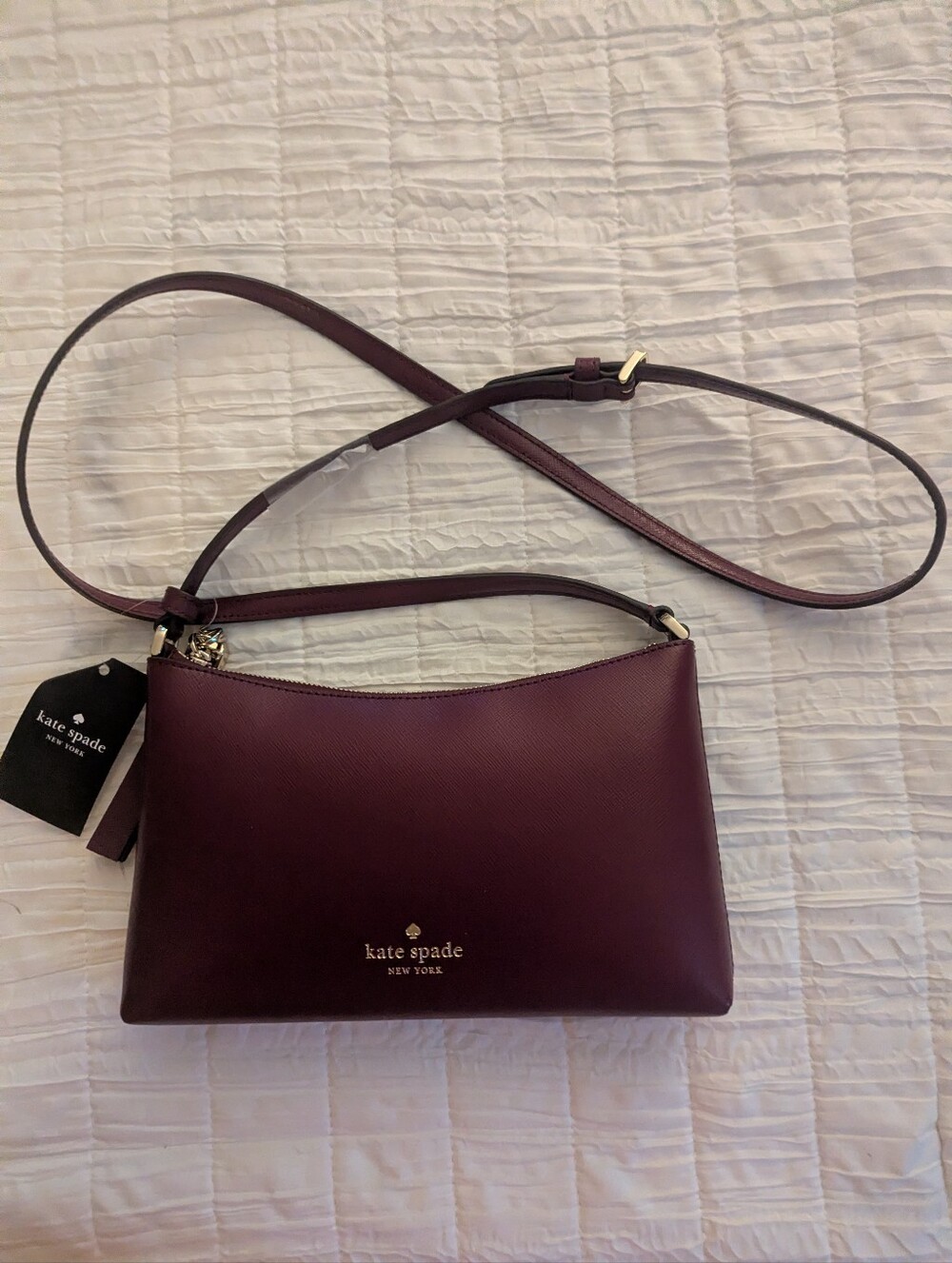 Kate Spade Plum Leather Crossbody with Gold Hardware.
